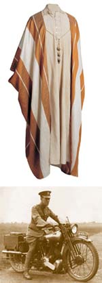 Ceremonial robe given to T.E. Lawrence, and a photo of him with the the type of motorcycle he died on.