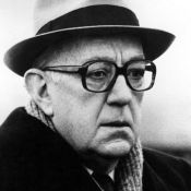Alec Guinness as George Smiley